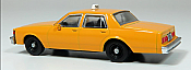 Rapido 800007 - HO Scale 1980-1985 Chevrolet Impala Sedan - Assembled - Taxi