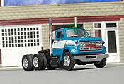 Sylvan Scale Models V-375 HO Scale - 1966-77 GMC 9500 Low Cab Tandem Axle Short Hood Tractor - Unpainted and Resin Cast Kit