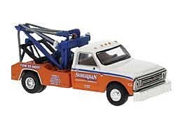 Brekina 19667 - HO 1981 GMC C30 Tow Truck - Assembled -- Suburban (white, orange, blue)