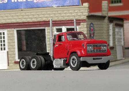 Sylvan Scale Models V-373 HO Scale - 1966-77 GMC 9500 Low Cab Tandem Axle Long Hood Tractor - Unpainted and Resin Cast Kit