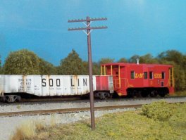 Rix Products 32 - HO 2-Arm Railroad Telephone Poles - Kit - 18 Poles & 36 Crossarms (brown)