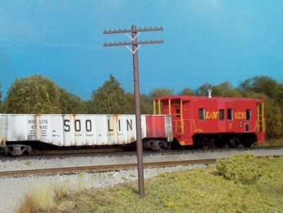 Rix Products 32 - HO 2-Arm Railroad Telephone Poles - Kit - 18 Poles & 36 Crossarms (brown)